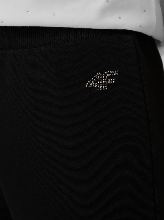 Dziewczęce spodnie dresowe 4F 4FJRSS26TTROF1728 - czarne