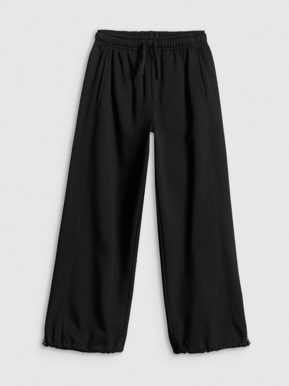 Dziewczęce spodnie dresowe 4F 4FJRSS26TTROF1869 - czarne