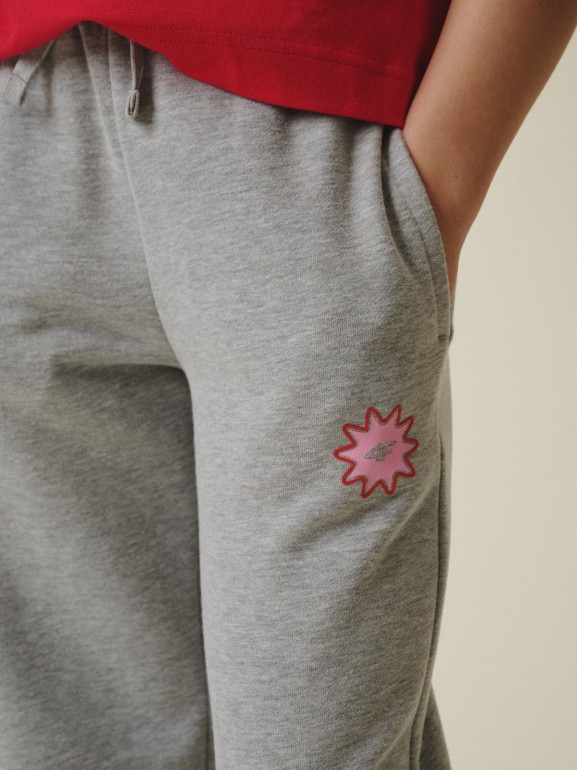 Dziewczęce spodnie dresowe 4F 4FJRSS26TTROF1870 - szare