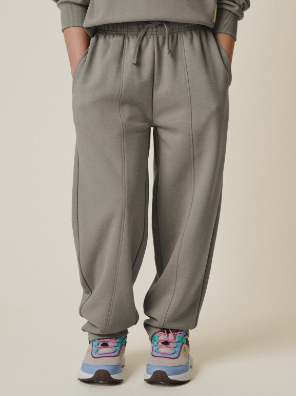 Dziewczęce spodnie dresowe 4F 4FJRSS26TTROF1871 - beżowe