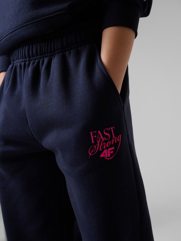 Dziewczęce spodnie dresowe 4F 4FJRSS26TTROF1878 - granatowe