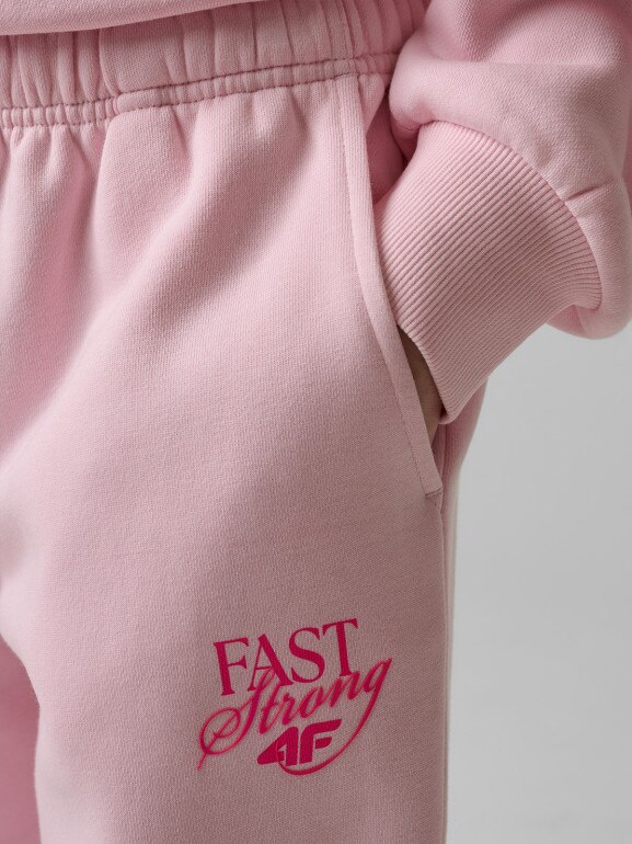 Dziewczęce spodnie dresowe 4F 4FJRSS26TTROF1878 - różowe