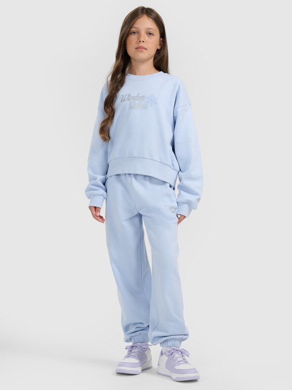 Dziewczęce spodnie dresowe joggery 4F 4FJRAW25TTROF1642 - niebieskie