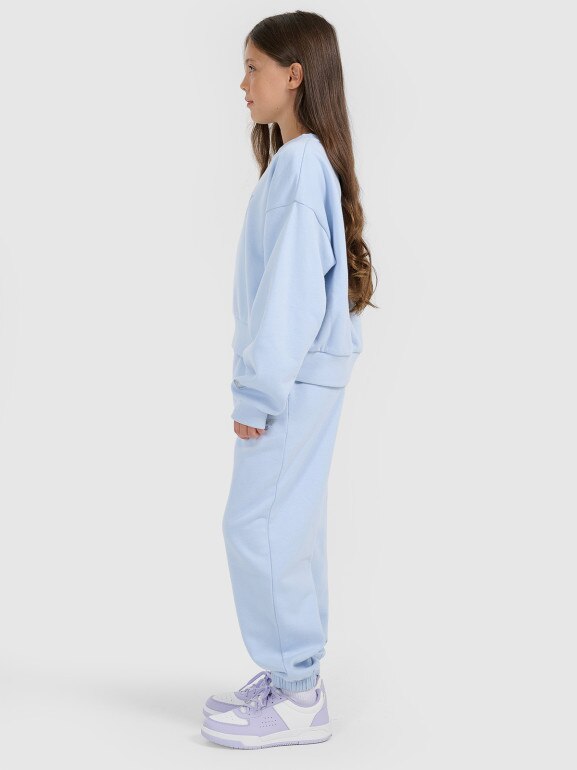 Dziewczęce spodnie dresowe joggery 4F 4FJRAW25TTROF1642 - niebieskie