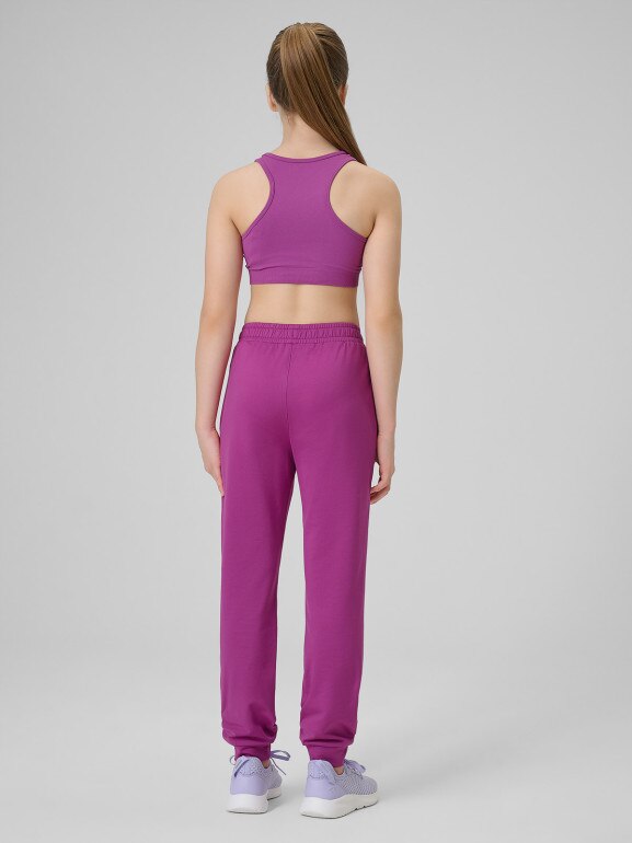 Dziewczęce spodnie dresowe joggery 4F 4FJRSS26TFTRF1458 - różowe