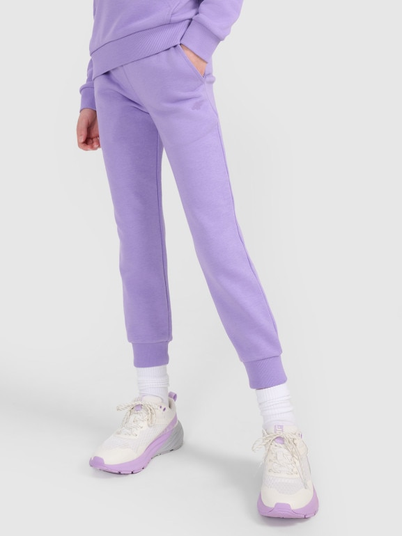 Dziewczęce spodnie dresowe joggery 4F 4FJWSS25TTROF1099 - fioletowe