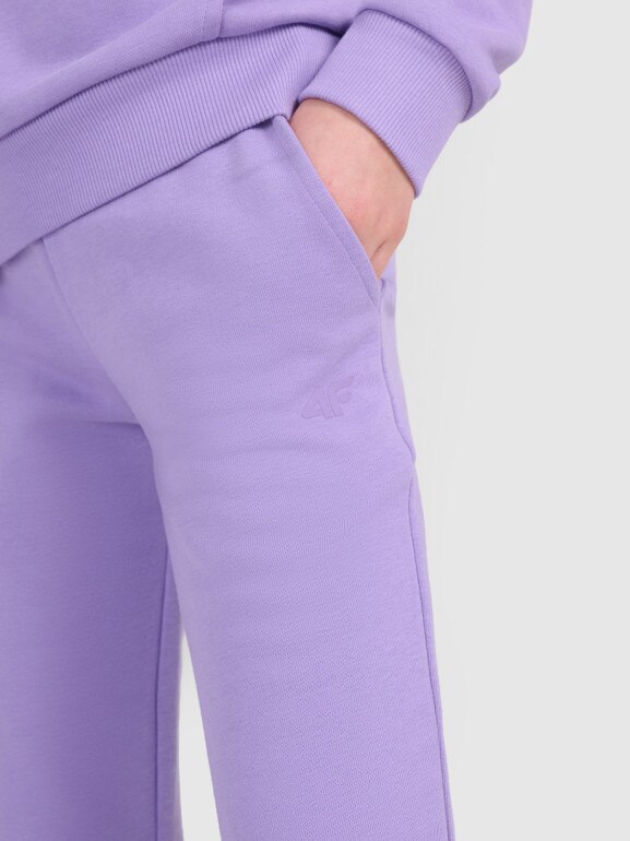 Dziewczęce spodnie dresowe joggery 4F 4FJWSS25TTROF1099 - fioletowe