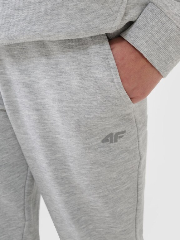 Dziewczęce spodnie dresowe joggery 4F 4FJWSS25TTROF1099 - szare