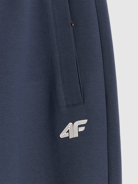 Męskie spodnie dresowe joggery 4F 4FRSS26TTROM1917 - granatowe