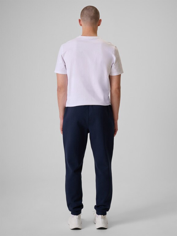 Męskie spodnie dresowe joggery 4F 4FRSS26TTROM1917 - granatowe