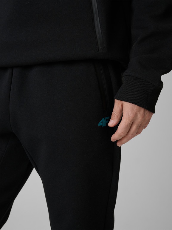Męskie spodnie dresowe joggery 4F 4FRSS26TTROM1962 - czarne