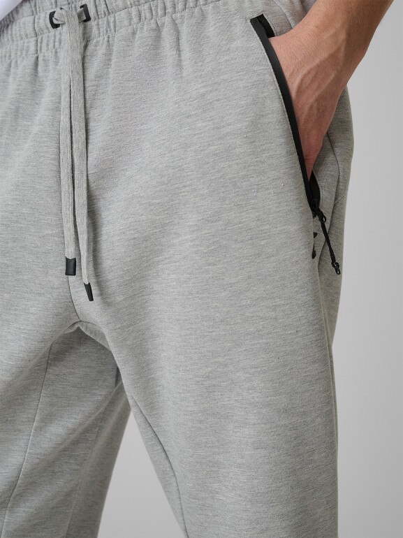 Męskie spodnie dresowe joggery 4F 4FRSS26TTROM1962 - szare