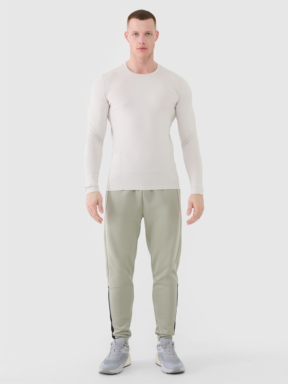 Męskie spodnie treningowe 4F 4FWSS25TFTRM0836 - khaki