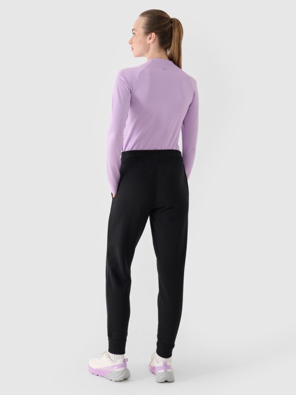 Damskie spodnie dresowe 4F 4FWMM00TTROF0946 - czarne