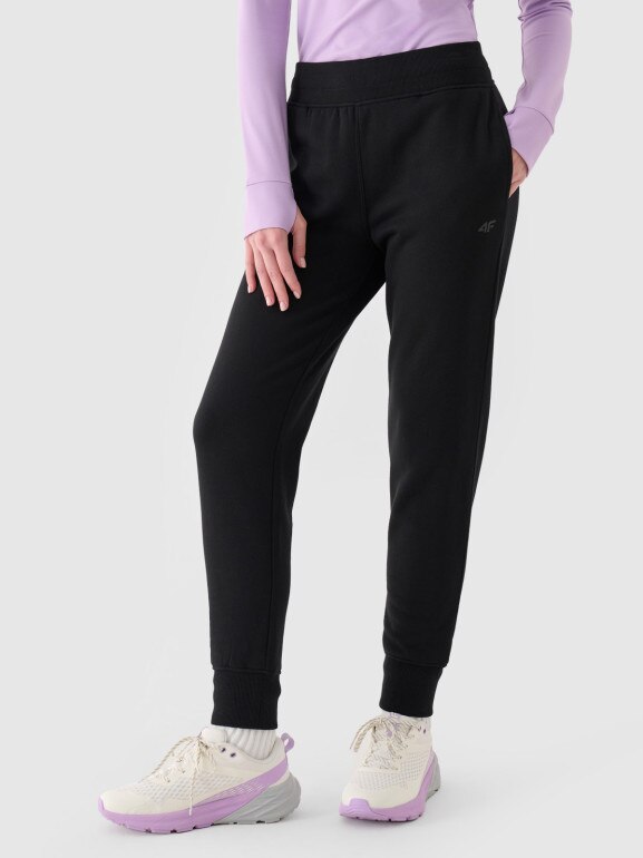 Damskie spodnie dresowe 4F 4FWMM00TTROF0946 - czarne