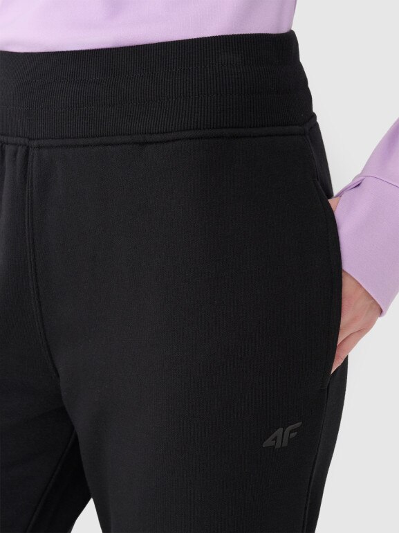 Damskie spodnie dresowe 4F 4FWMM00TTROF0946 - czarne