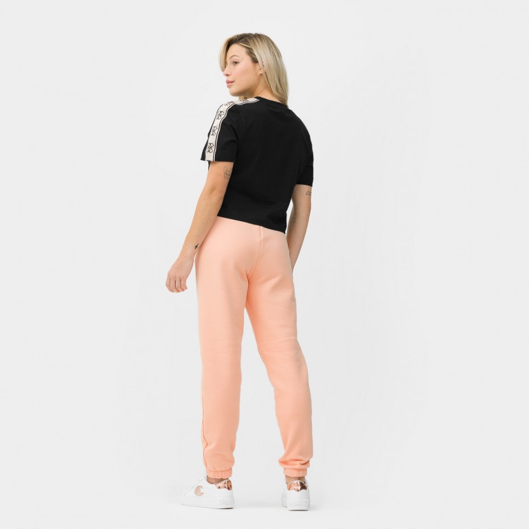 Damskie spodnie dresowe GUESS ALISHA LONG PANTS - różowe