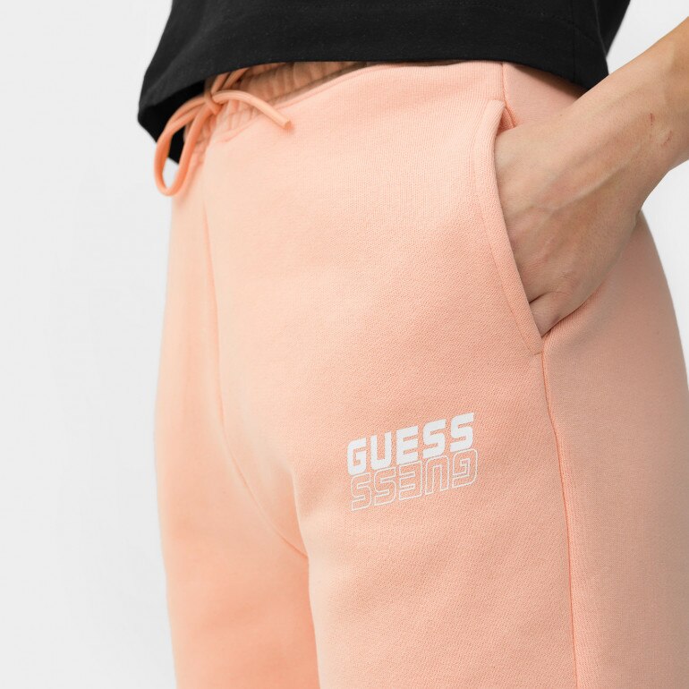 Damskie spodnie dresowe GUESS ALISHA LONG PANTS - różowe