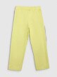 Damskie spodnie casual 4F 4FRSS25TTROF1448 - żółty