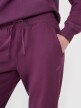 Damskie spodnie dresowe joggery 4F 4FWSS25TTROF0993 - fioletowe