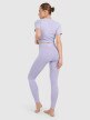 Damskie legginsy do jogi i pilatesu 4F 4FWAW25TFTIF369  - fioletowe