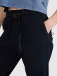Damskie spodnie casual 4F 4FWSS25TTROF1002 - czarne