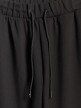 mini: Damskie spodnie dresowe joggery 4F 4FWSS26TTROF1412 - czarne (9)