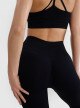 Damskie legginsy do jogi bezszwowe 4F 4FWSS25TFTIF347 - czarne