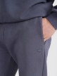 Spodnie dresowe joggery uniseks 4F 4FWSS25TTROU0997 - granatowe