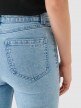 Damskie jeansy skinny Outhorn OTHWAW24TJNSF002 - niebieskie