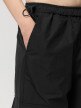 Damskie spodnie parachute Outhorn OTHWSS24TTROF727 - czarne 