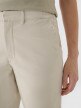 Damskie spodnie casual tkaninowe Outhorn OTHWAW24TTROF1084 - beżowe