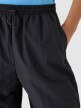 Damskie spodnie casual tkaninowe Outhorn OTHWAW24TTROF1222 - czarne