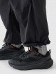 Damskie spodnie casual tkaninowe Outhorn OTHWAW24TTROF1222 - czarne