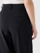 Damskie spodnie casual tkaninowe Outhorn OTHWAW24TTROF0904 - czarne