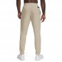 Męskie spodnie treningowe Under Armour UA Unstoppable Tapered Pants - beżowe