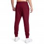 Męskie spodnie dresowe Under Armour UA Rival Terry Jogger - czerwone