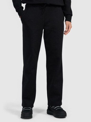 Damskie spodnie dresowe z szerokimi nogawkami 4F 4FRAW25TTROF1919 - czarne