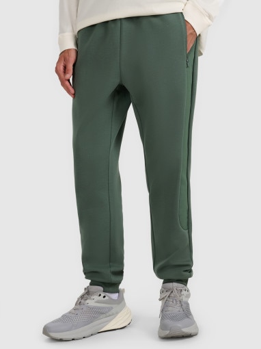 Męskie spodnie dresowe joggery 4F 4FWAW25TTROM1252 - khaki