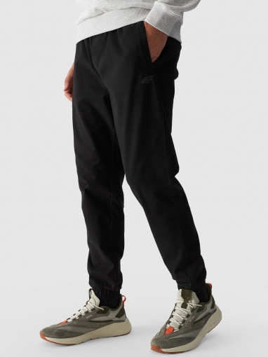 Męskie spodnie casual joggery 4F 4FWMM00TTROM0944 - czarny