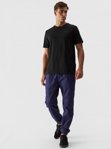 4F Męskie spodnie casual joggery 4F 4FWMM00TTROM0944  granatowy Granat