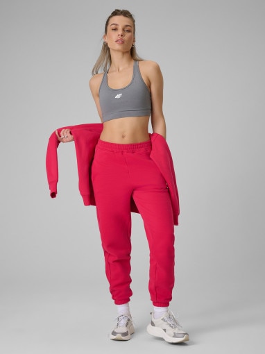  4F Damskie spodnie dresowe joggery 4F 4FRSS26TTROF1724  czerwone Czerwony