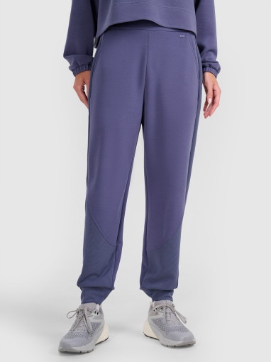 Damskie spodnie dresowe joggery 4F 4FWAW25TTROF1180 - niebieskie