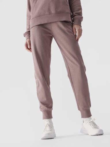 Damskie spodnie dresowe joggery 4F 4FWMM00TTROF0945 - beżowe