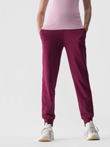 Damskie spodnie dresowe joggery 4F 4FWMM00TTROF0945 - różowe