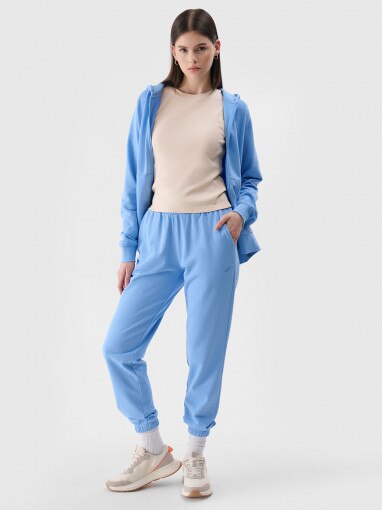 4F Damskie spodnie dresowe joggery 4F 4FWMM00TTROF1138  niebieskie  Niebieski