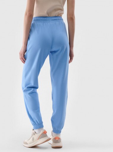 Damskie spodnie dresowe joggery 4F 4FWMM00TTROF1138 - niebieskie 