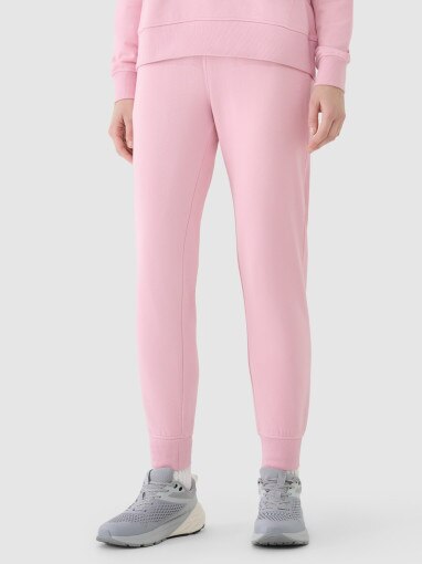 Damskie spodnie dresowe joggery 4F 4FWMM00TTROF1386 - różowe