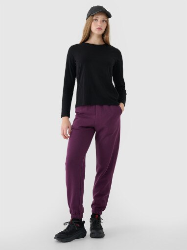 4F Damskie spodnie dresowe joggery 4F 4FWSS25TTROF1013 fioletowe Fioletowy