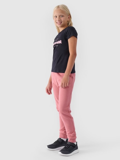 Dziewczęce spodnie dresowe joggery 4F 4FJWMM00TTROF0829-27M - różowe